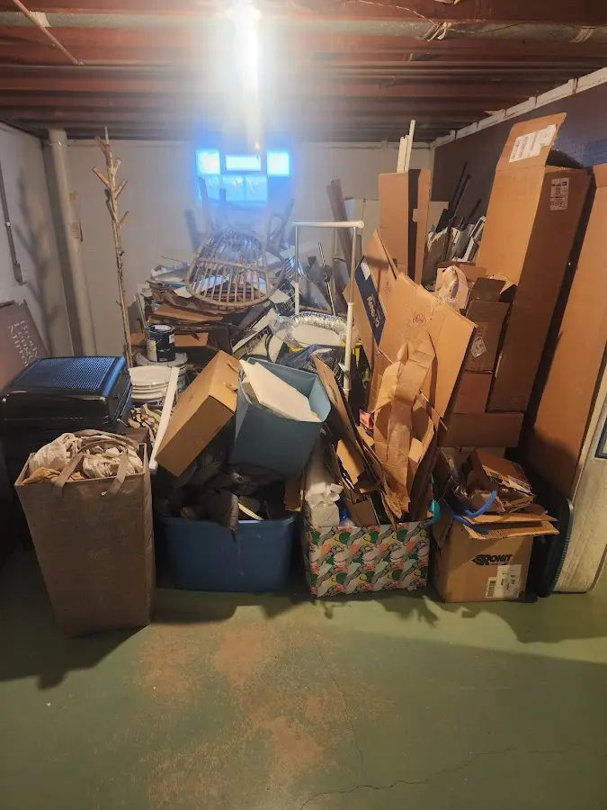 Roll-off dumpster container at job site for 8 Yard Dumpster Rental in Kaiminani